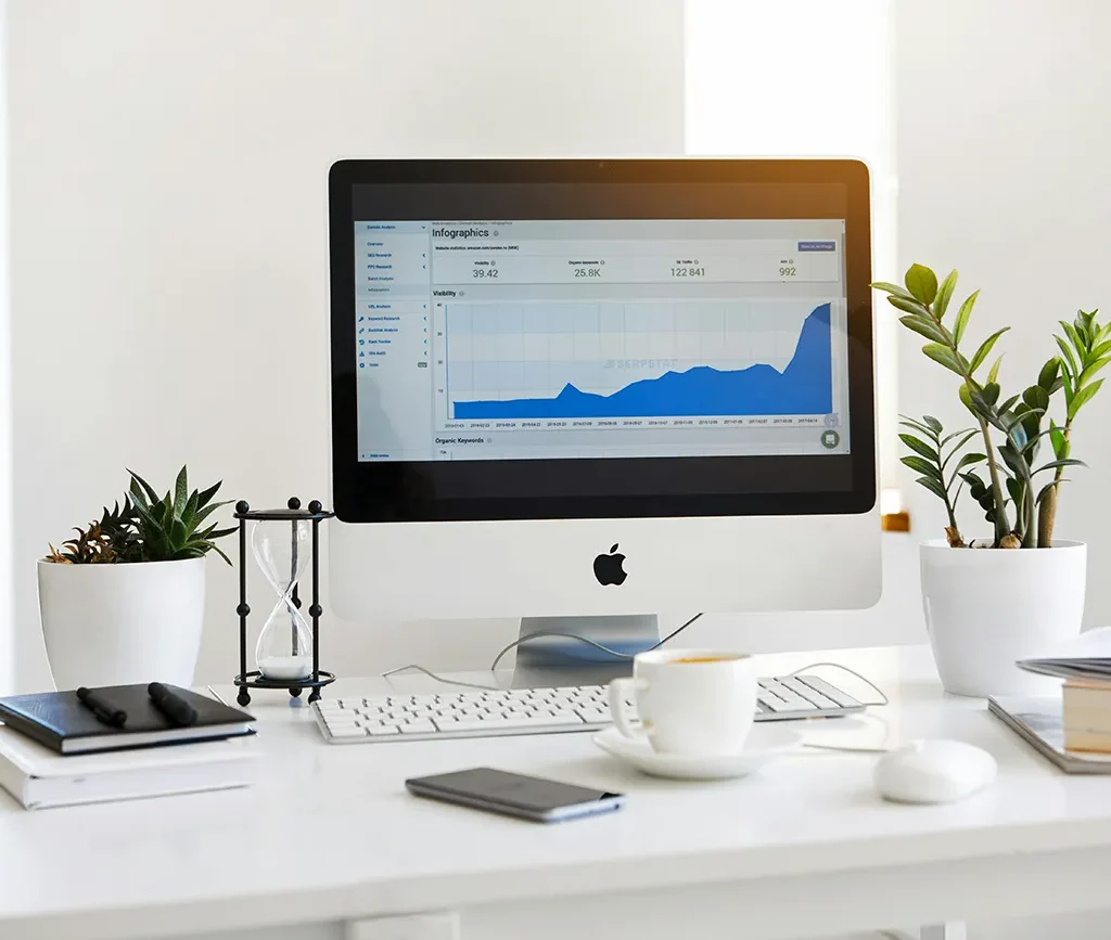 Web designer reviewing an outdated business website – representing the timeline for redesigning a site